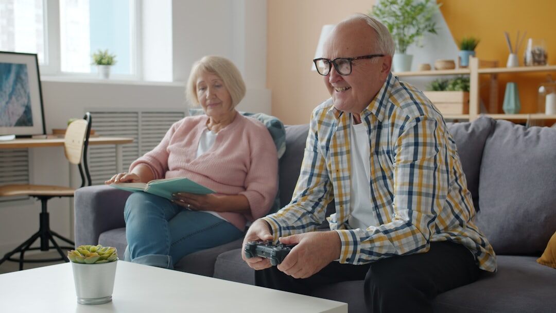 senior couple playing board game