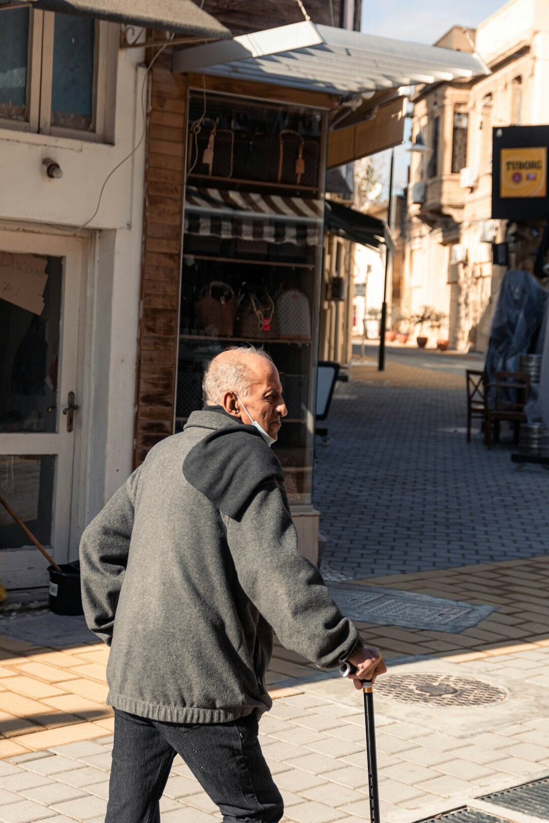 elderly person using safety rail