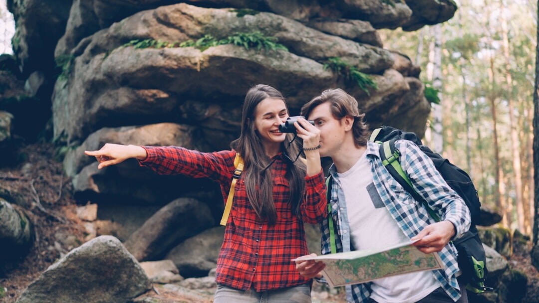 senior couple reading map