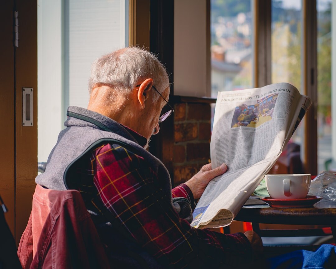 senior couple reading news