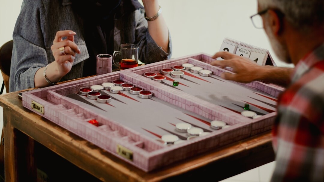 senior couple playing board game