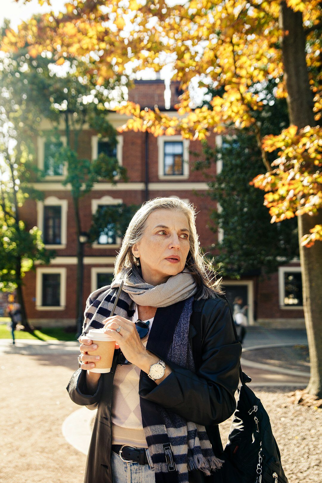 senior enjoying autumn tea