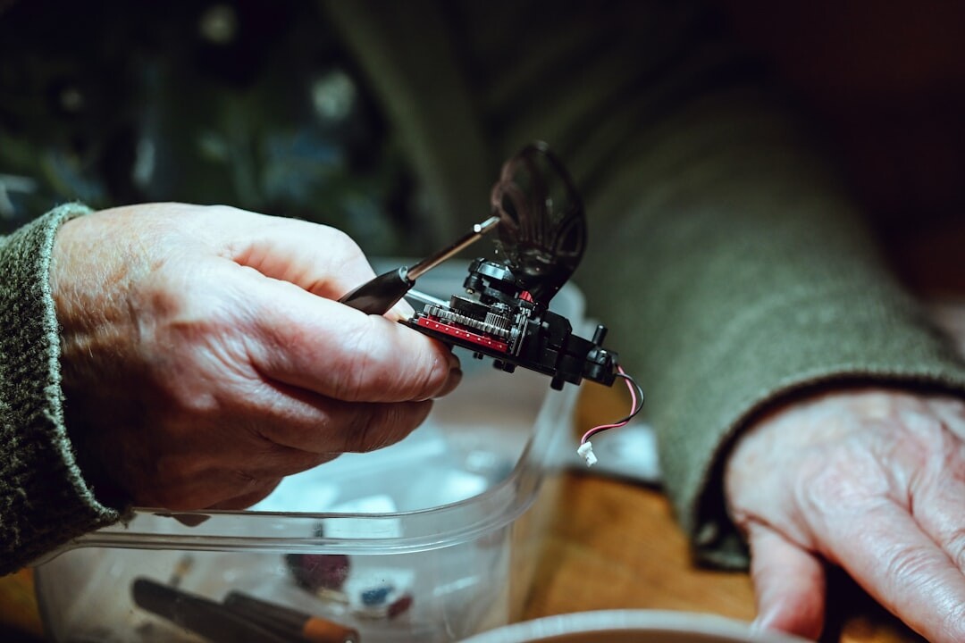 elderly hands crafting with leaves
